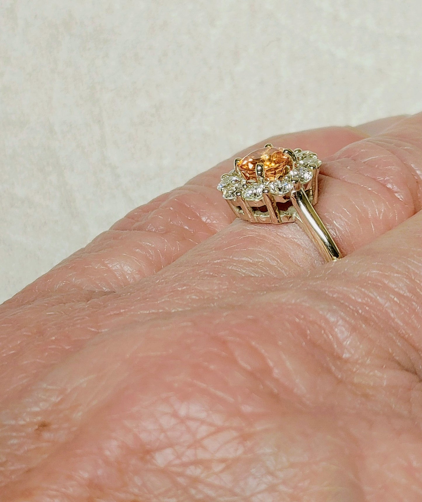 14K White Gold Diamond Halo Ring set with Orange Sapphire