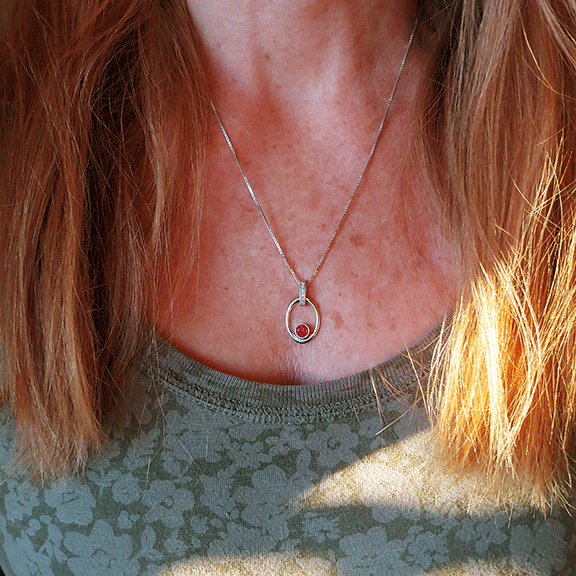 FIre & Ice Sunstone Pendant on model