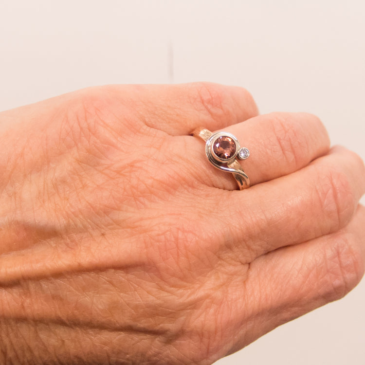 Lasso Bezel Set Sunstone Ring hand