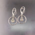 Silver Saturn dangle earring champagne