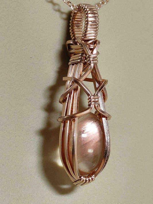 Sunstone-Rose Gold, Wire Wrap Pendant, Oval Peach Schiller Cabochon