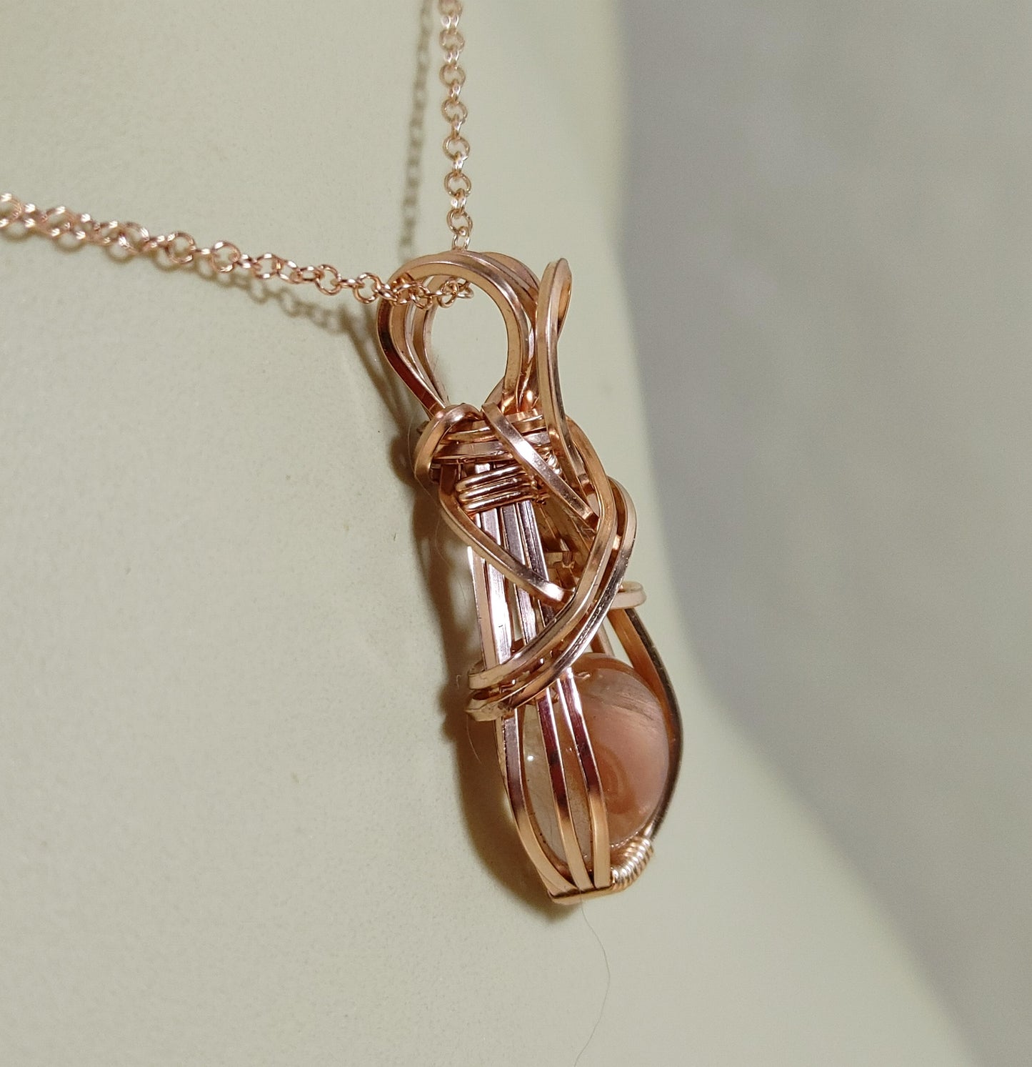 Sunstone-Rose Gold, Wire Wrap Pendant, Oval Peach Schiller Cabochon