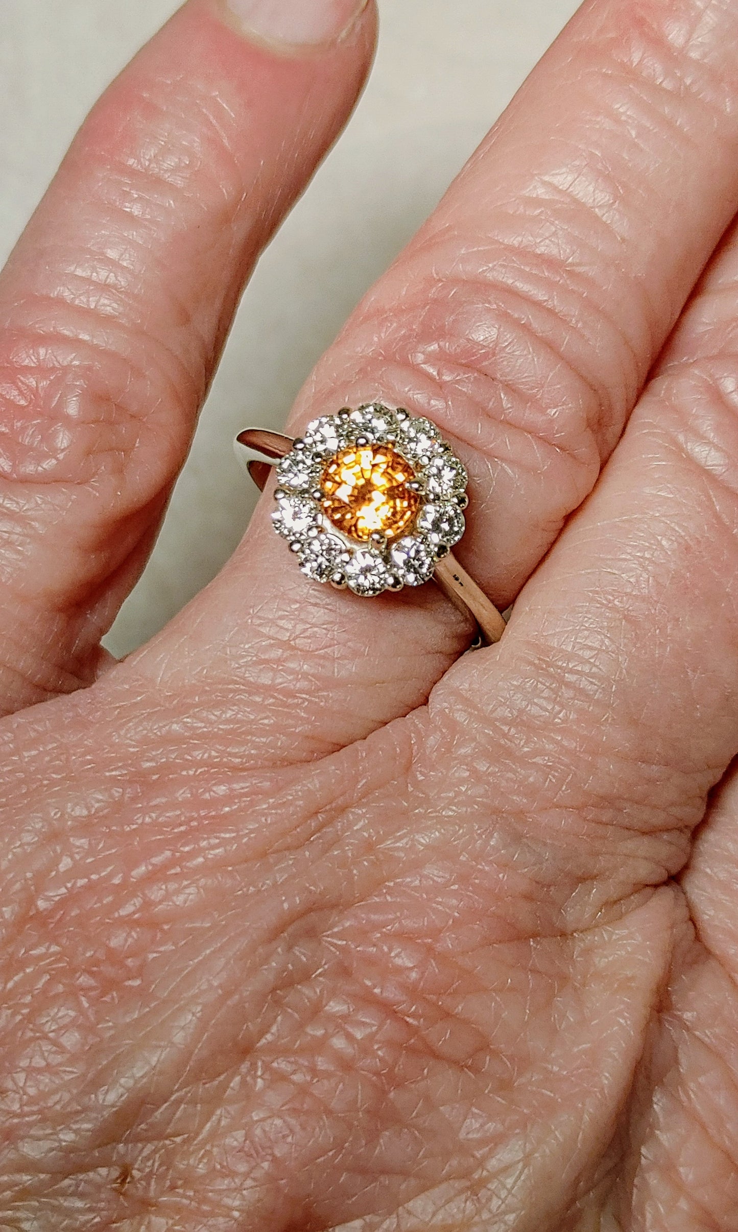 14K White Gold Diamond Halo Ring set with Orange Sapphire