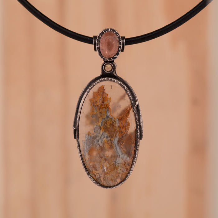 "Sunstone Nebula" Pendant-Plume Agate with Oregon Sunstone set in Sterling Silver.