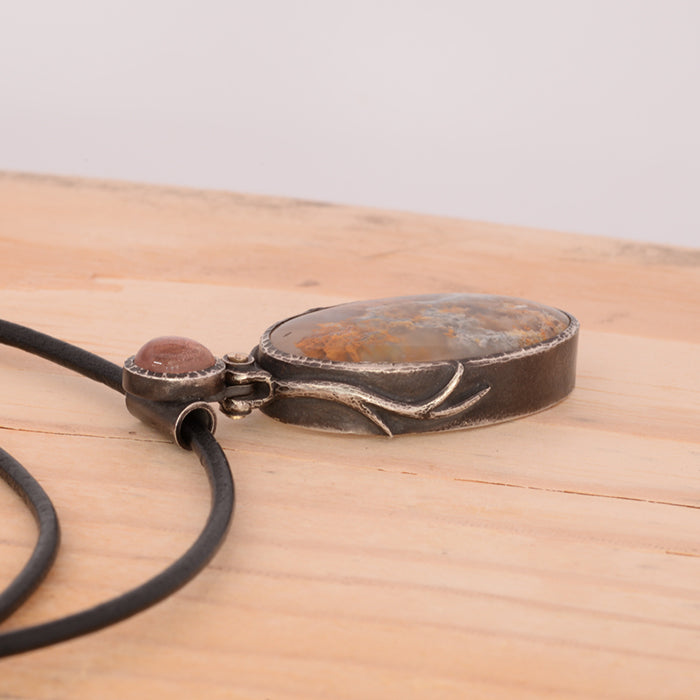 "Sunstone Nebula" Pendant-Plume Agate with Oregon Sunstone set in Sterling Silver.