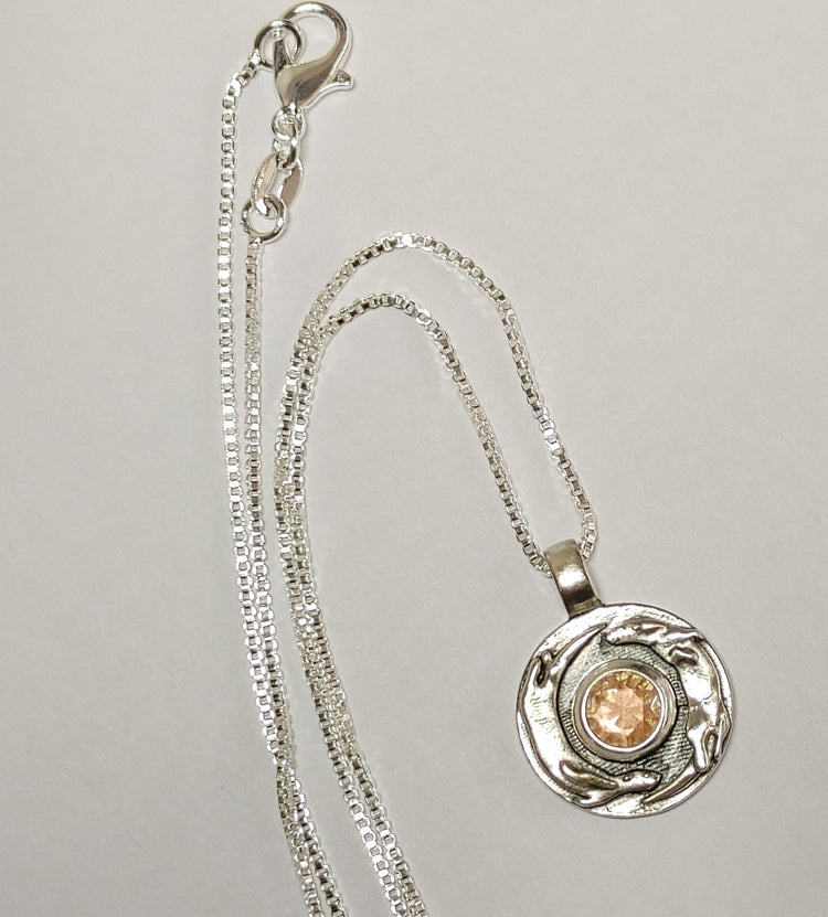 Silver Playful Otter Pendant with Sunstone