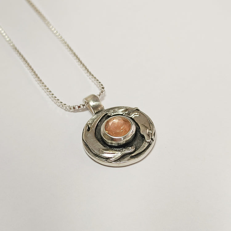 Silver Playful Otter Pendant with Sunstone