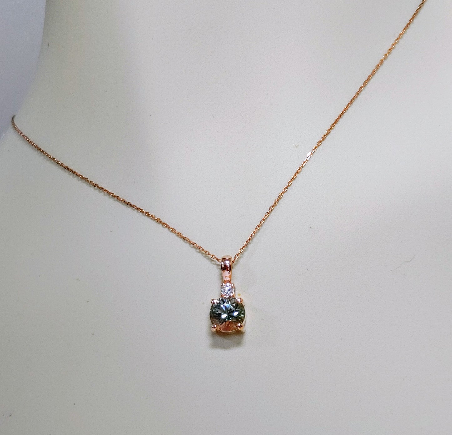 Limited Edition Necklace! Rare Green Oregon Sunstone set in Rose Gold with diamond.