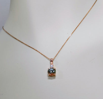 Limited Edition Necklace! Rare Green Oregon Sunstone set in Rose Gold with diamond.