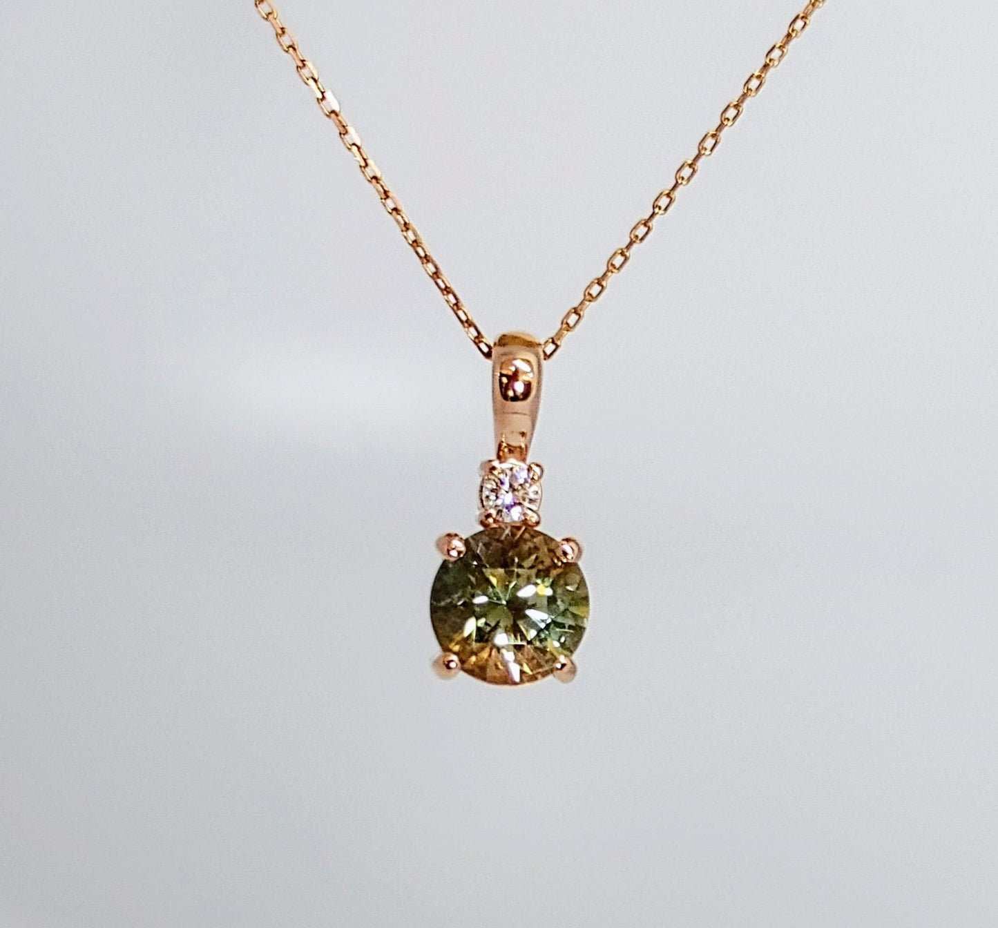 Limited Edition Necklace! Rare Green Oregon Sunstone set in Rose Gold with diamond.