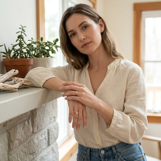Full-body shot of a stylish model outdoors wearing a rose gold sunflower ring with Oregon Sunstone, casual summer outfit, natural lighting.