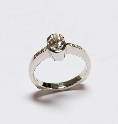 Custom Bezel Set-.69 ct. Oval Diamond Ring