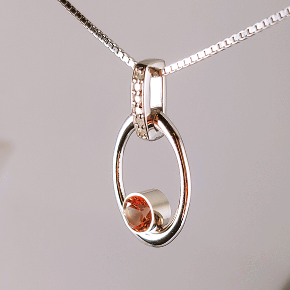 FIre & Ice Sunstone Pendant side view